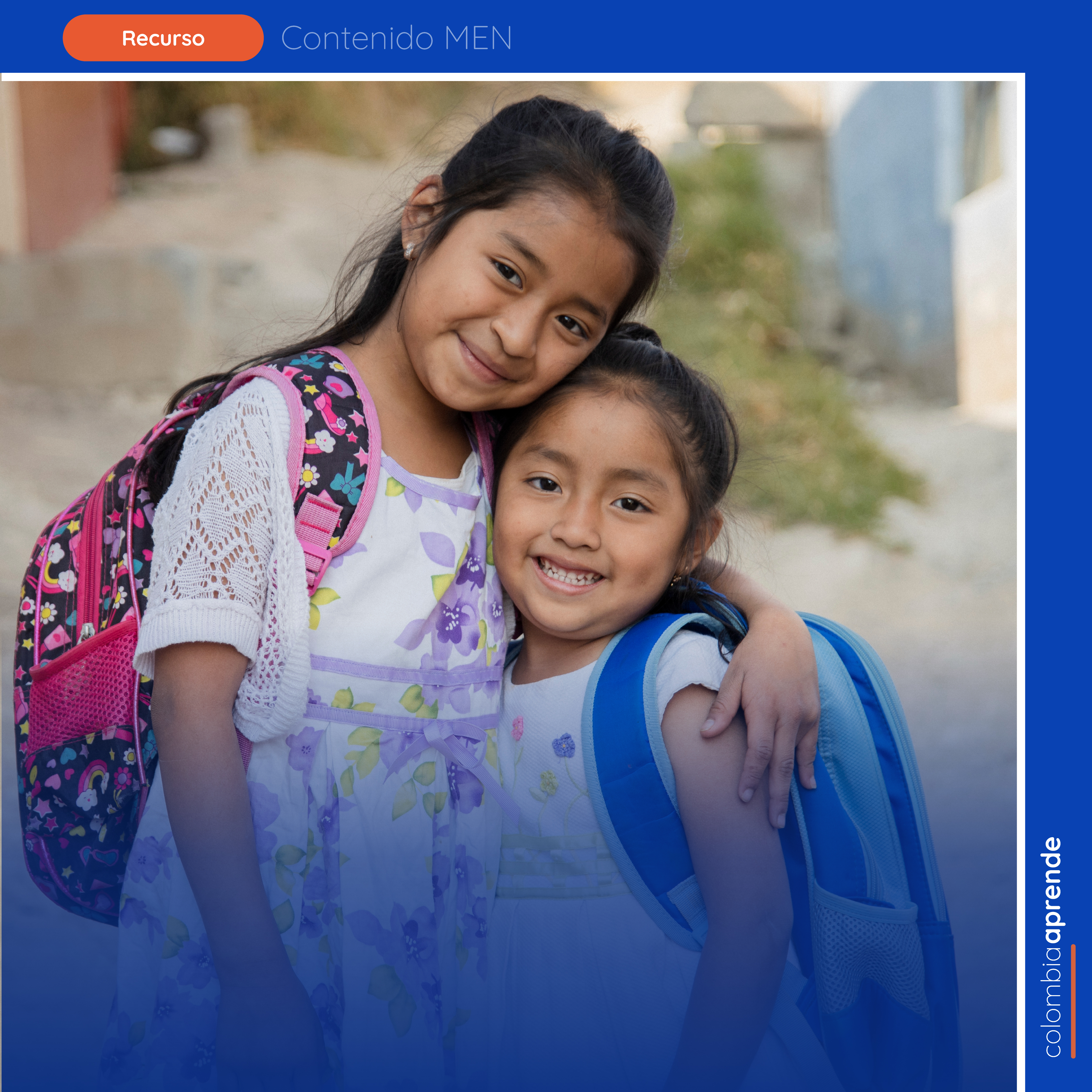 NIñas abrazadas sonriendo a la cámara